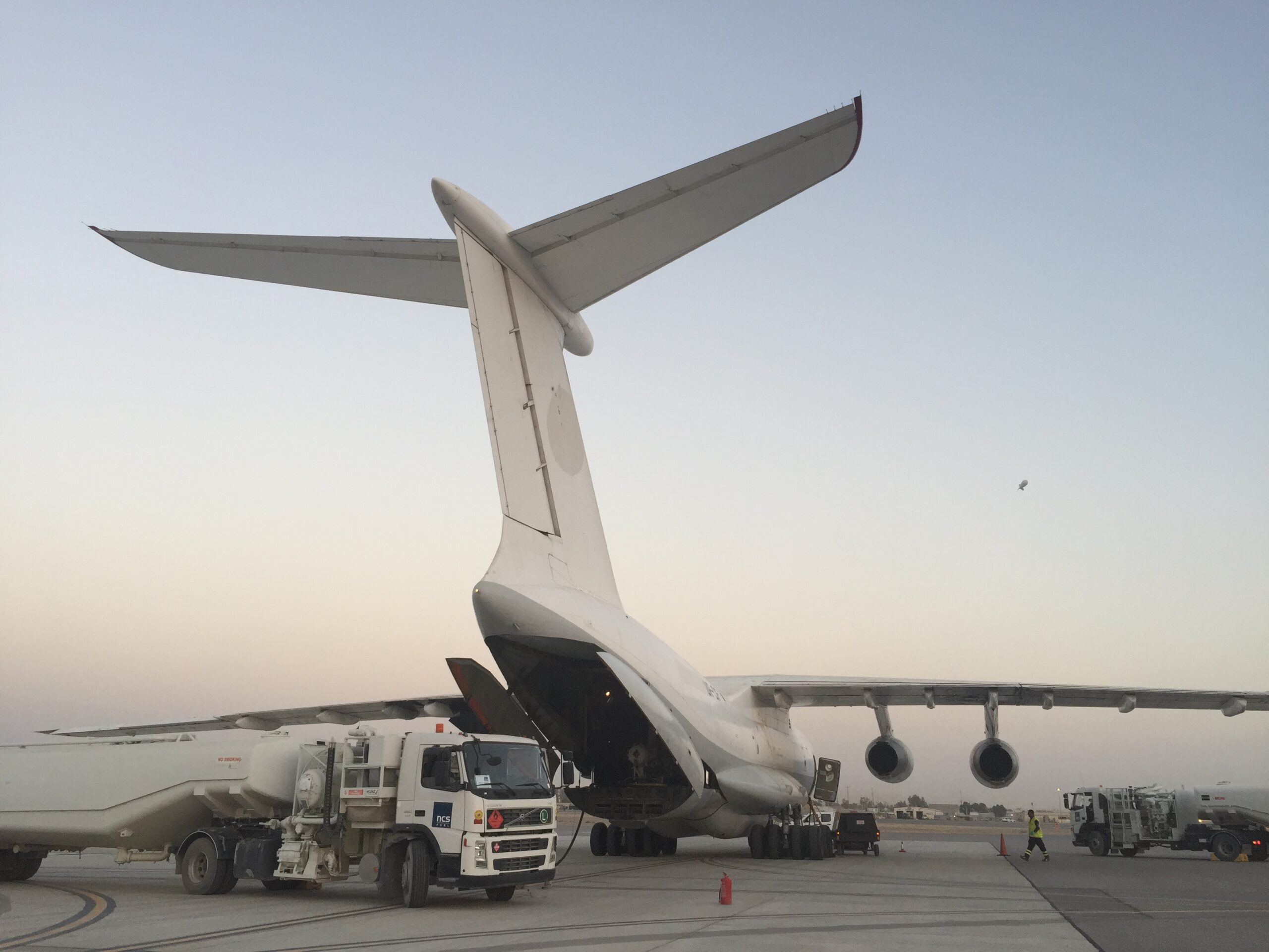 Three trucks parked next to each other