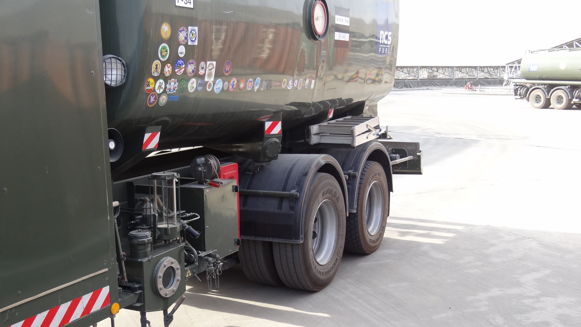 Three trucks parked next to each other