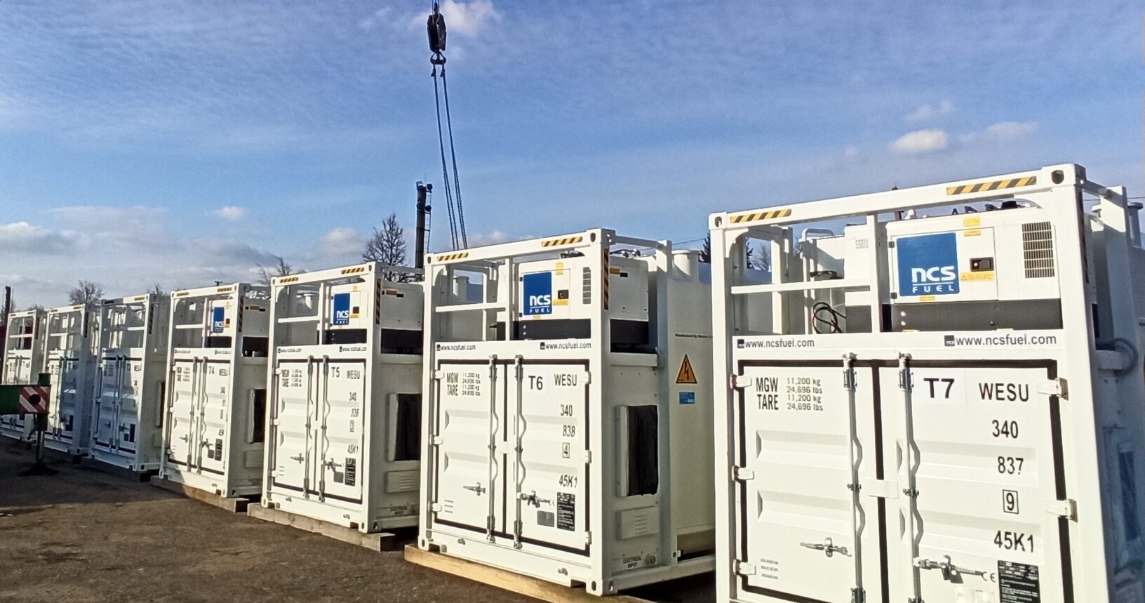 Three trucks parked next to each other